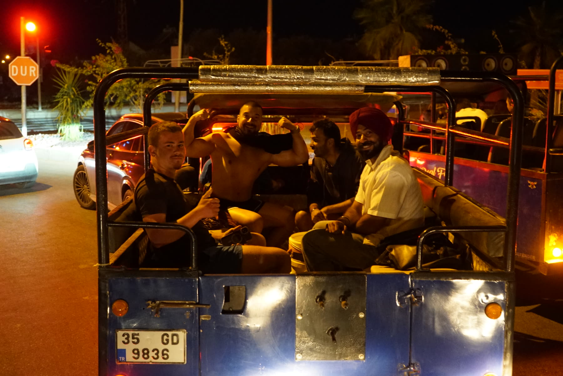 Holistic SEO Mastermind attendees sharing a night safari ride in Kuşadası
