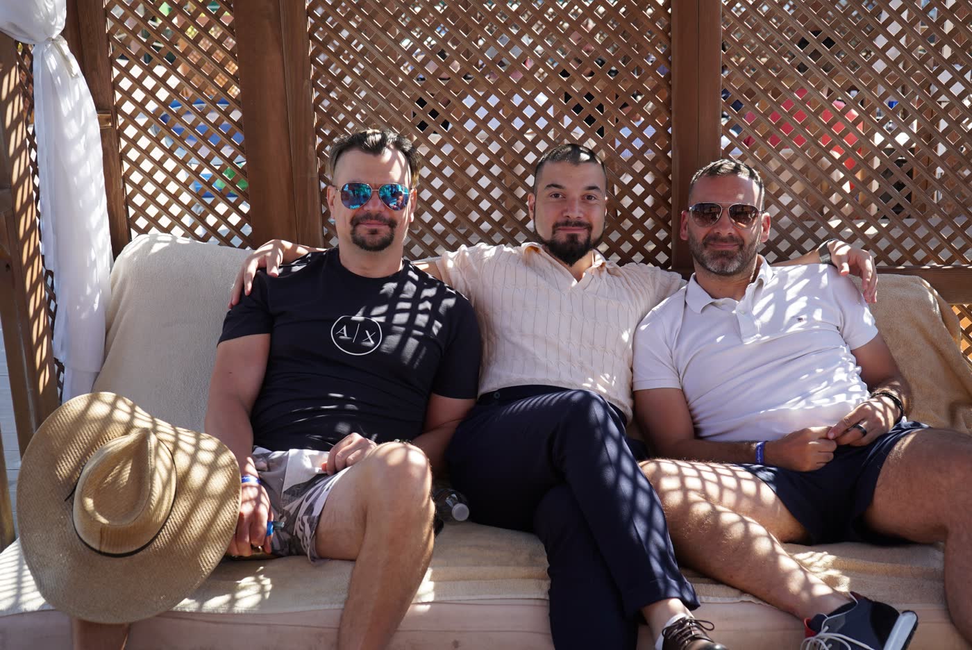 Koray seated with two attendees between sessions