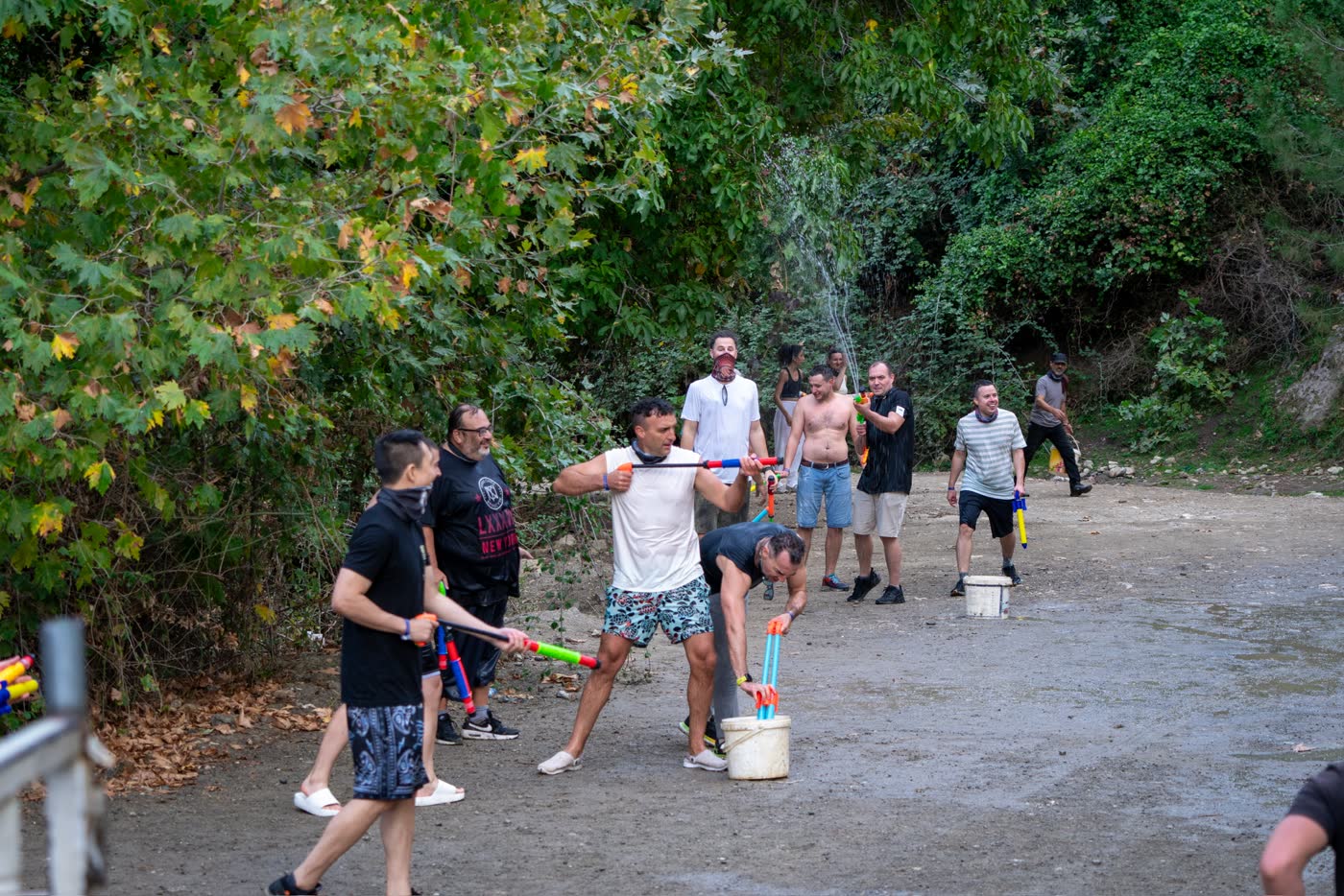 The group taking part in an outdoor water game