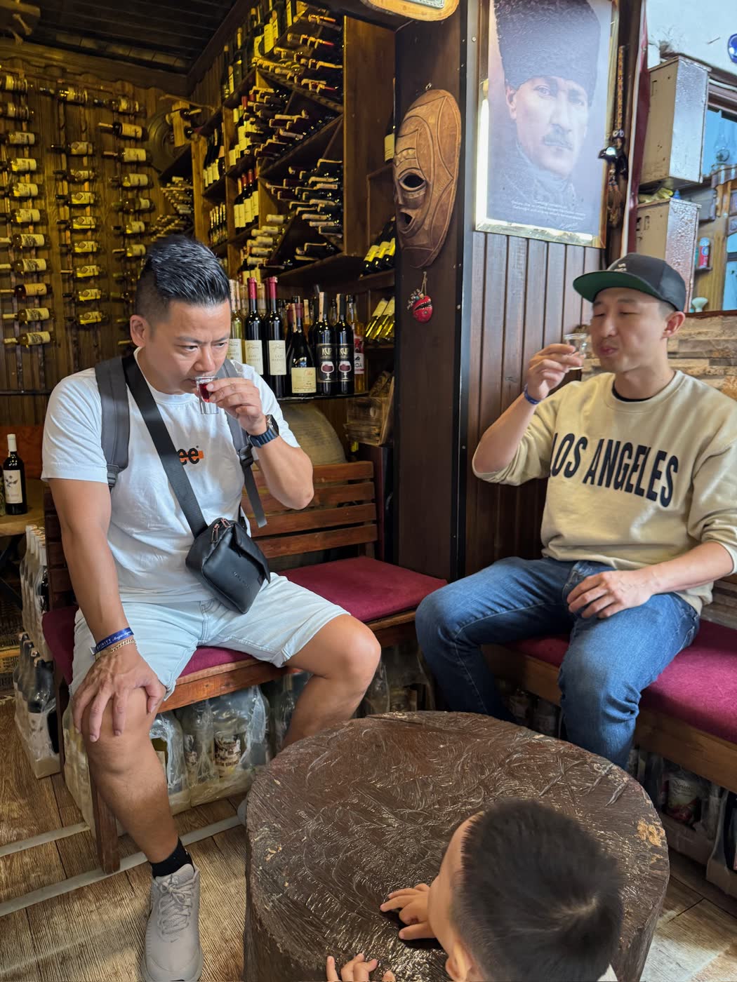 Attendees discovering a local wine during a cultural visit